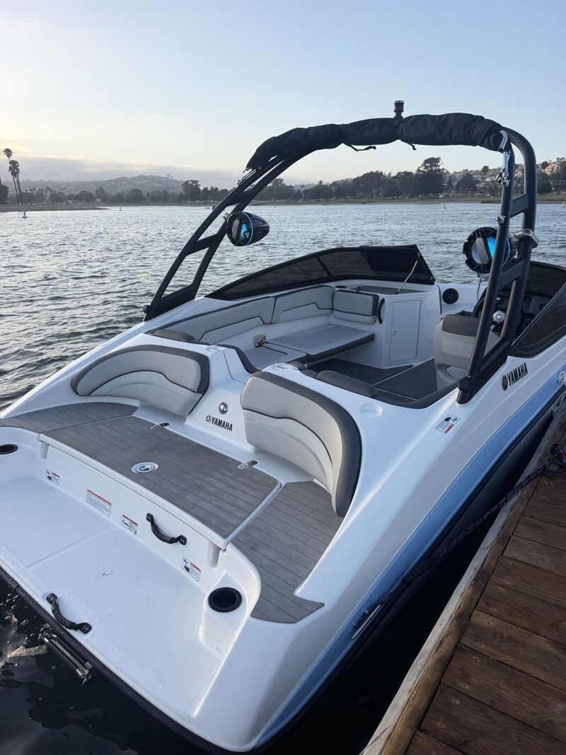 The M&M Legacy boat tied up at the dock, ready to board
